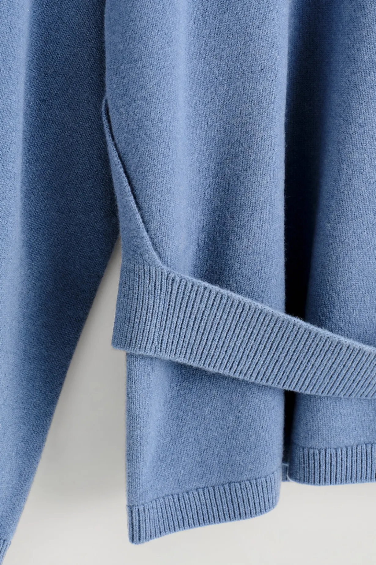BELT-DETAIL MERINO WOOL SWEATER