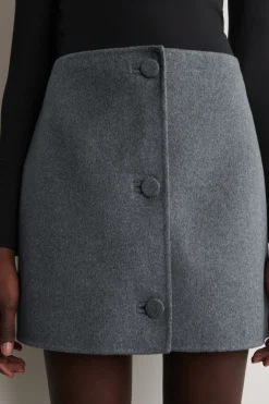 BUTTONED DOUBLE-FACED WOOL MINI SKIRT