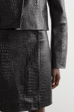 CROC-EFFECT LEATHER MINI WRAP SKIRT