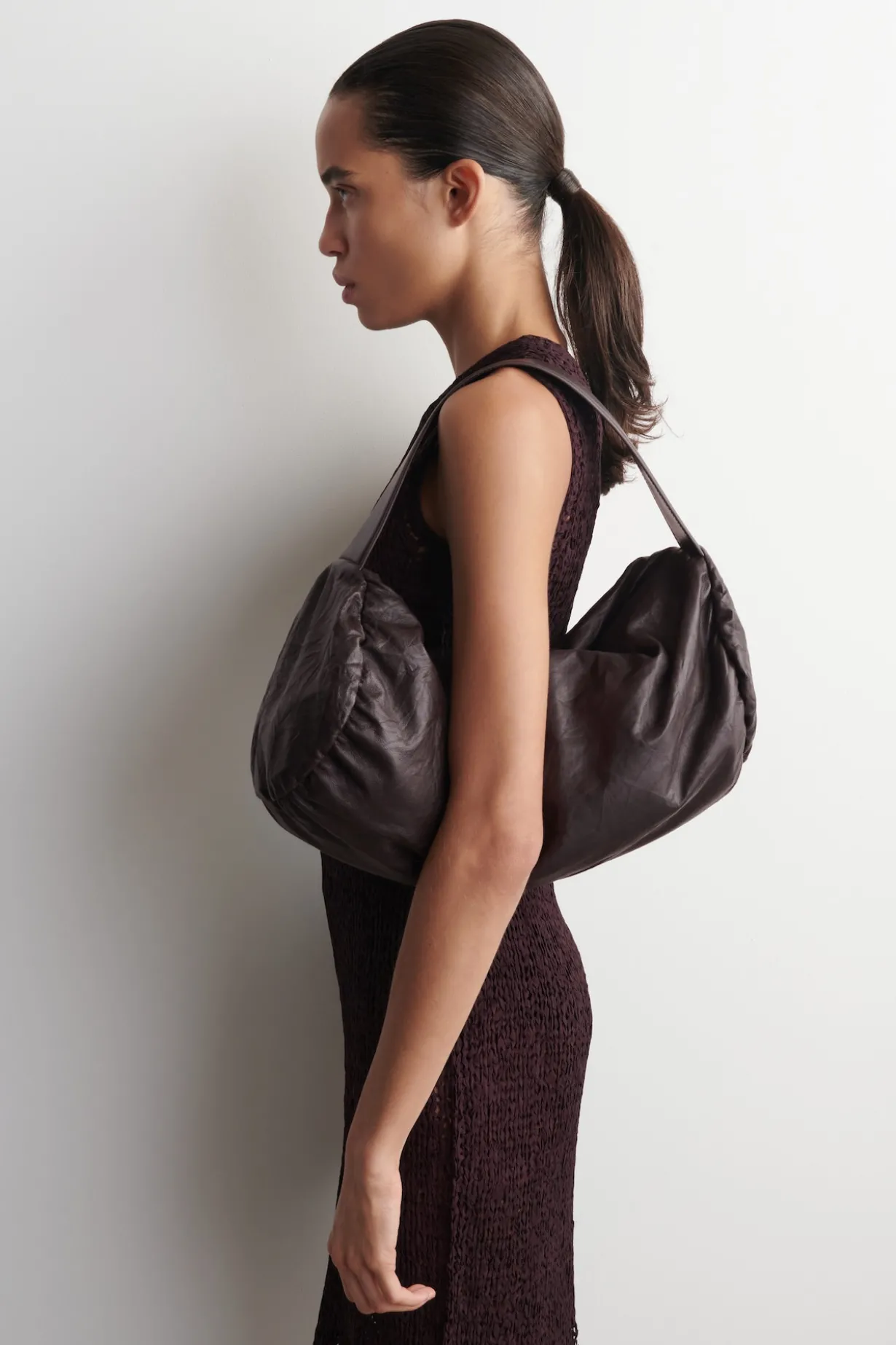 CYLINDER CLUTCH BAG - TEXTURED-LEATHER