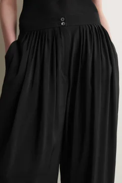 DRAPED PLEATED STRAIGHT-LEG PANTS