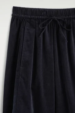 ELASTICATED CORDUROY BARREL-LEG PANTS