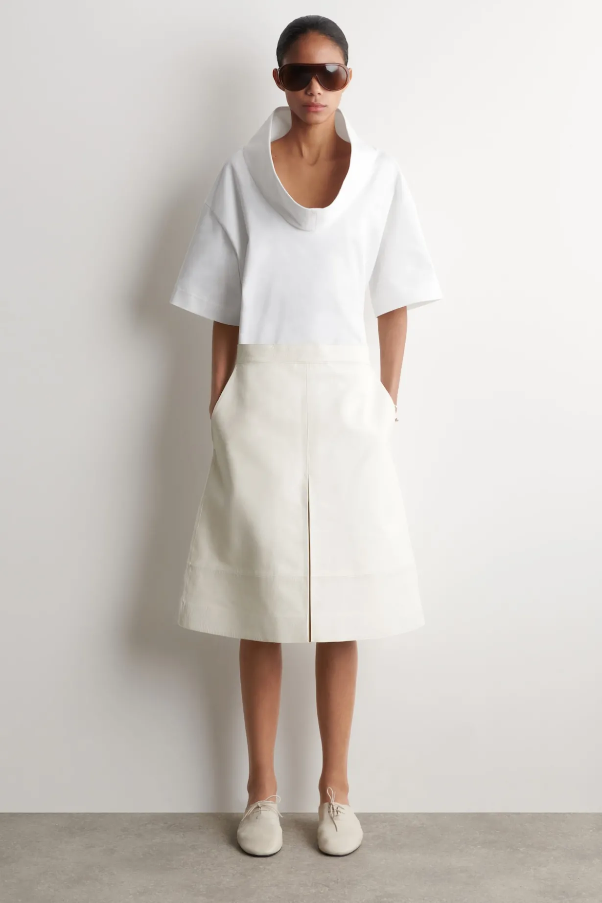 EXAGGERATED MOCK-NECK TOP