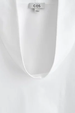 EXAGGERATED MOCK-NECK TOP