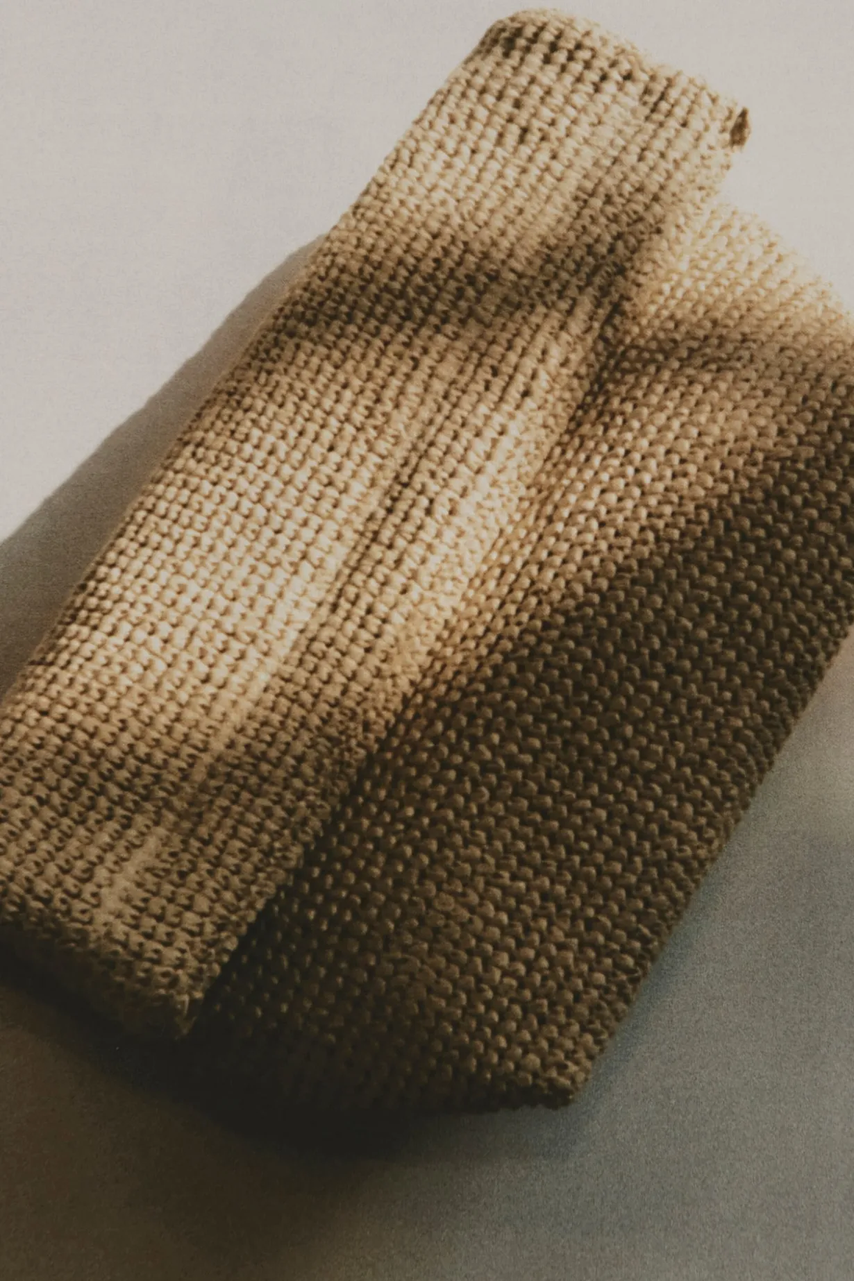FOLDED CLUTCH BAG - STRAW