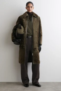 LEATHER-BONDED SHEARLING LONG COAT