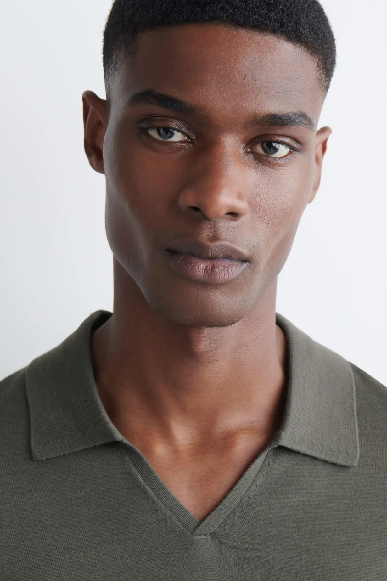 OPEN-COLLAR MERINO WOOL POLO SHIRT