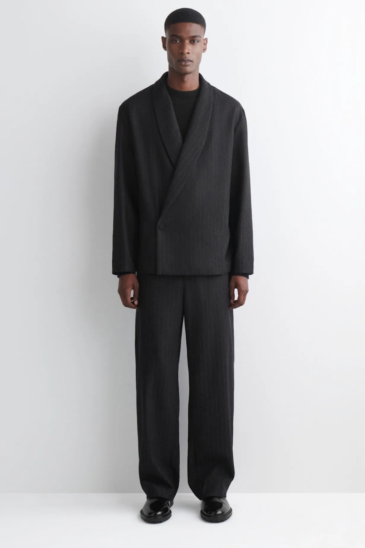 PINSTRIPED WOOL RELAXED-FIT TAPERED PANTS