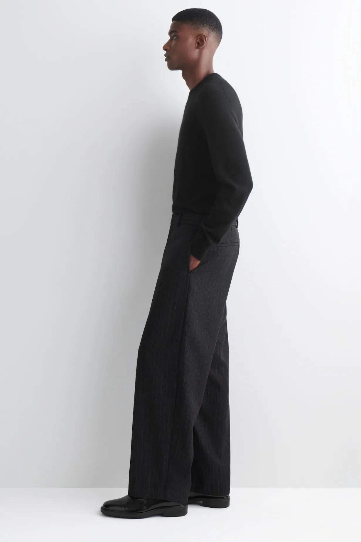 PINSTRIPED WOOL RELAXED-FIT TAPERED PANTS