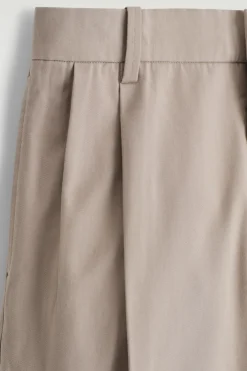 PLEATED RELAXED-FIT TAPERED PANTS