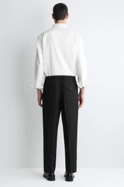 PLEATED RELAXED-FIT TAPERED PANTS