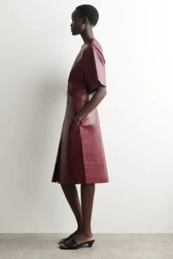 PLEATED TEXTURED-LEATHER MIDI SKIRT