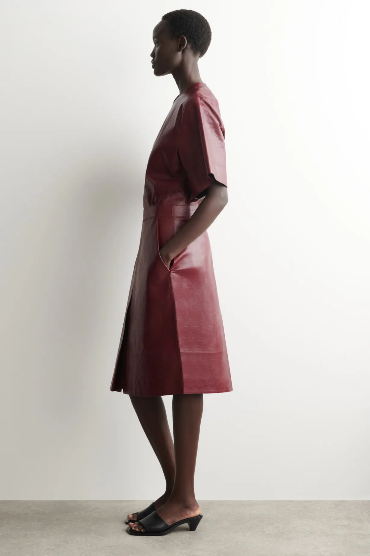 PLEATED TEXTURED-LEATHER MIDI SKIRT