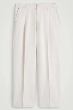 PLEATED WIDE-LEG DENIM PANTS