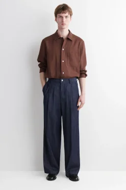 PLEATED WIDE-LEG DENIM PANTS