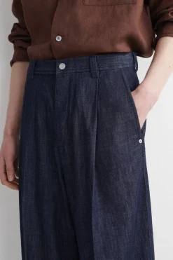 PLEATED WIDE-LEG DENIM PANTS