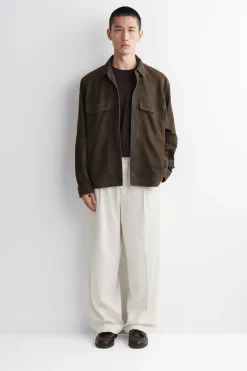 PLEATED WIDE-LEG DENIM PANTS
