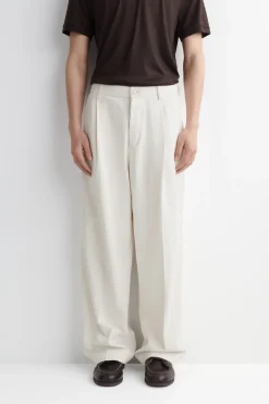 PLEATED WIDE-LEG DENIM PANTS