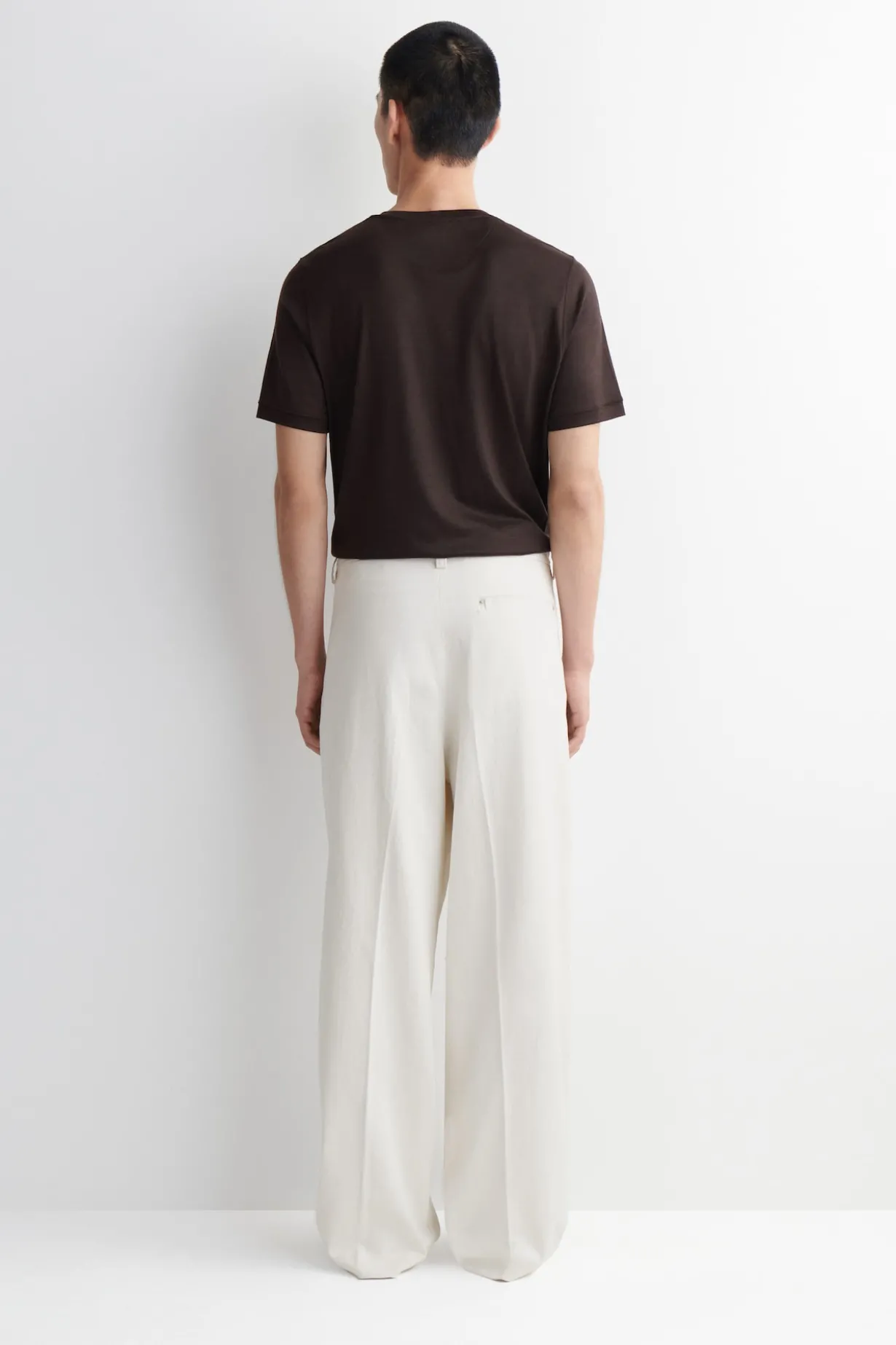 PLEATED WIDE-LEG DENIM PANTS