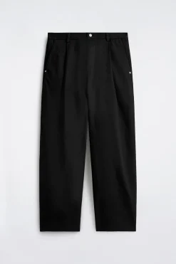 PLEATED WIDE-LEG DENIM PANTS
