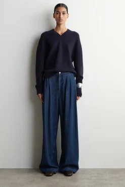 PLEATED WIDE-LEG DENIM PANTS