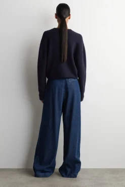 PLEATED WIDE-LEG DENIM PANTS