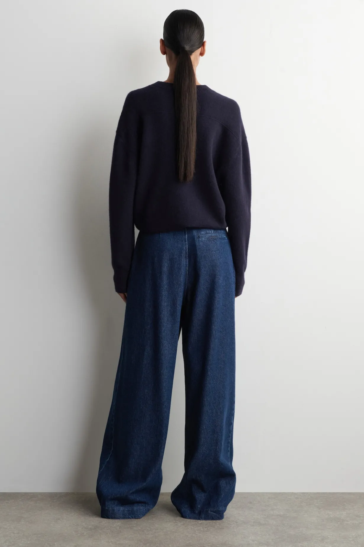 PLEATED WIDE-LEG DENIM PANTS