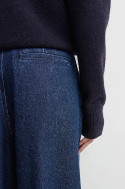 PLEATED WIDE-LEG DENIM PANTS