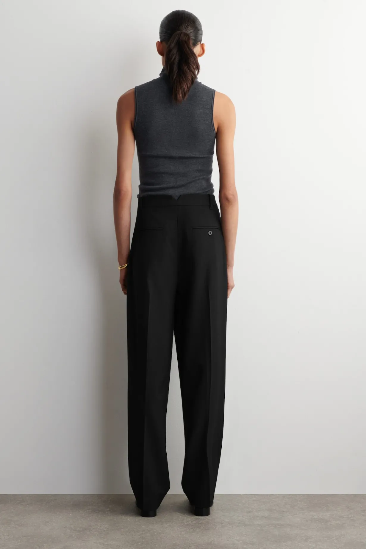 PLEATED WOOL-BLEND TAPERED PANTS