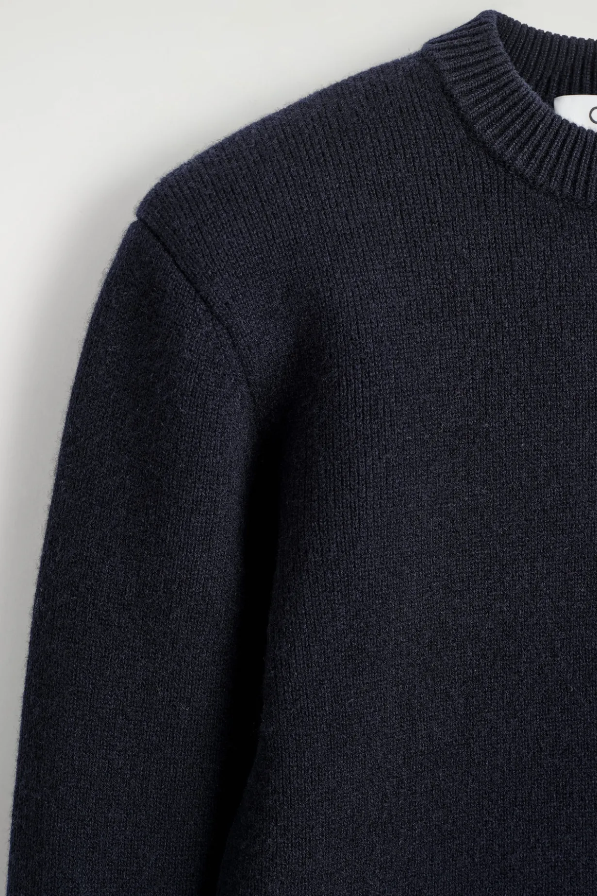SCULPTED-SHOULDER MERINO WOOL SWEATER