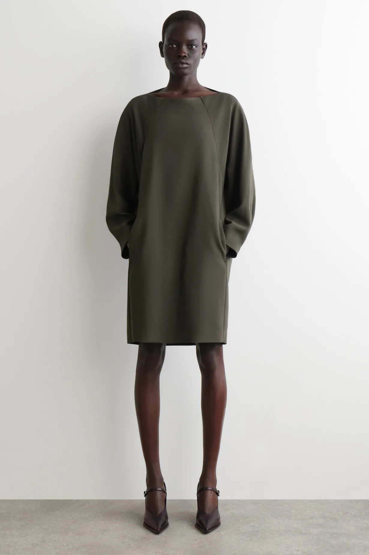 SCULPTURAL MINI DRESS