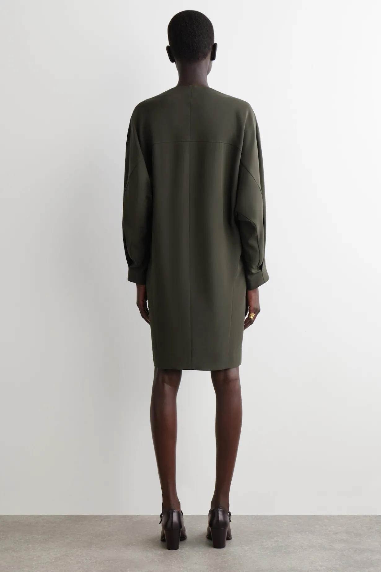 SCULPTURAL MINI DRESS