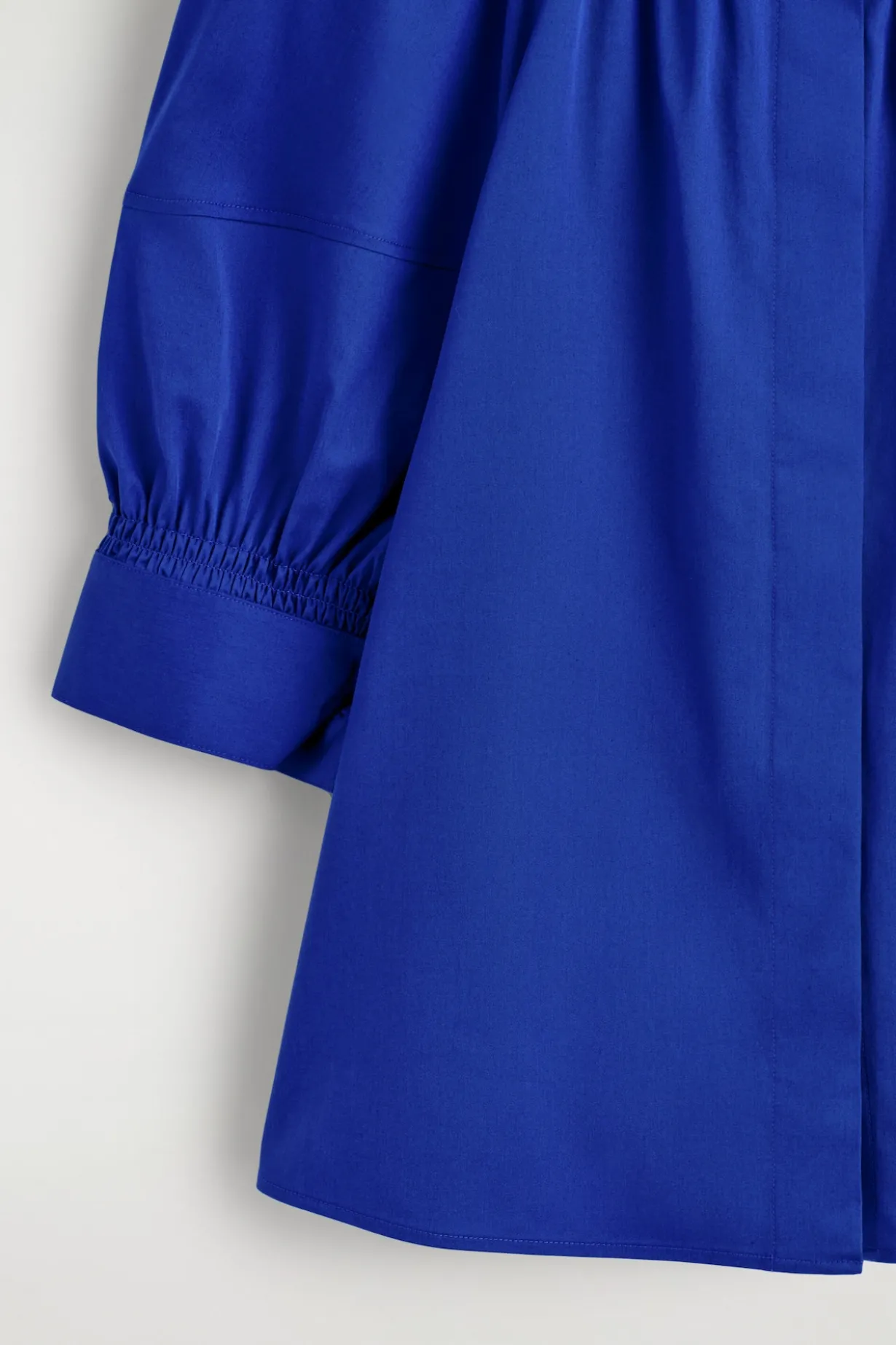 SMOCKED PUFF-SLEEVE BLOUSE