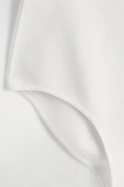 STRAPLESS RIBBED SILK BODYSUIT