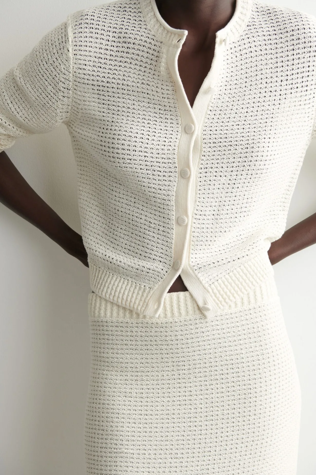 TEXTURED KNITTED COTTON MINI SKIRT